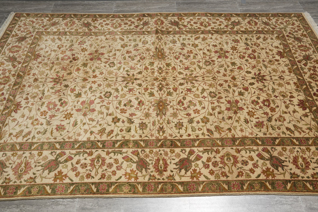 Decorative rug with intricate patterns on a wooden floor