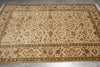 Load image into Gallery viewer, Decorative rug with intricate patterns on a wooden floor