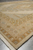 Load image into Gallery viewer, Close-up of a patterned rug with geometric design on a neutral background