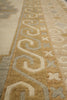 Load image into Gallery viewer, Close-up of a patterned beige and brown rug