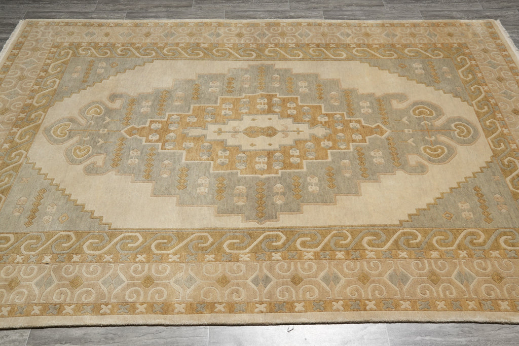 Decorative rug with geometric pattern on a wooden floor