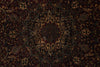 Load image into Gallery viewer, Close-up of a dark patterned rug with intricate designs.