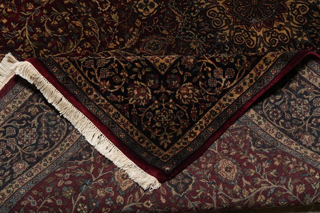 Close-up of an intricately designed rug with detailed patterns and colors.