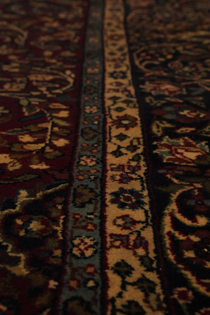 Close-up of a patterned rug with intricate designs.