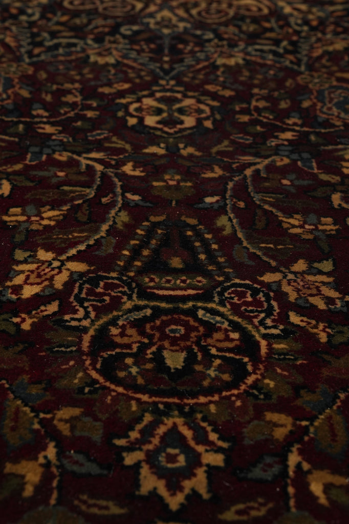 Close-up of a patterned rug with intricate designs.