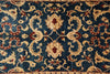 Load image into Gallery viewer, Close-up of an ornate rug with intricate patterns on a blue background