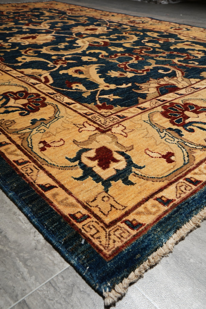 Decorative rug with intricate patterns on a tiled floor