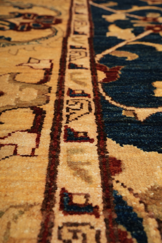 Close-up of an intricately patterned rug with geometric designs.