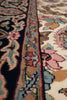 Load image into Gallery viewer, Close-up of a patterned rug with intricate designs.