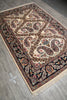 Load image into Gallery viewer, Decorative rug with intricate patterns on a wooden floor