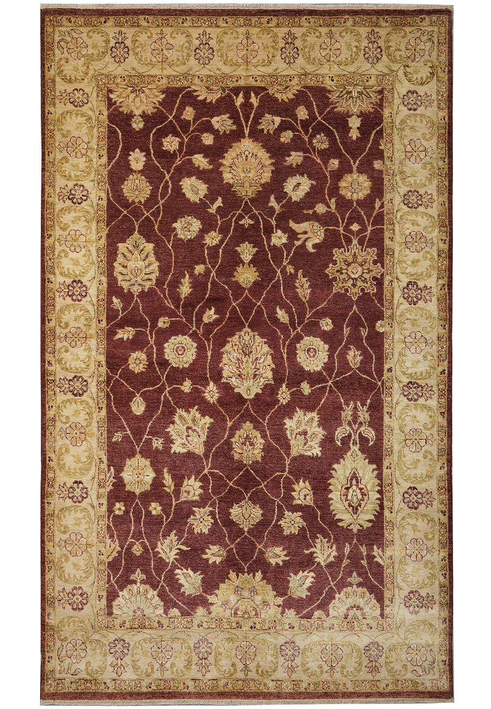Decorative rug with intricate floral patterns on a brown background
