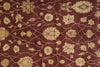 Load image into Gallery viewer, Close-up of a patterned fabric with intricate designs on a brown background