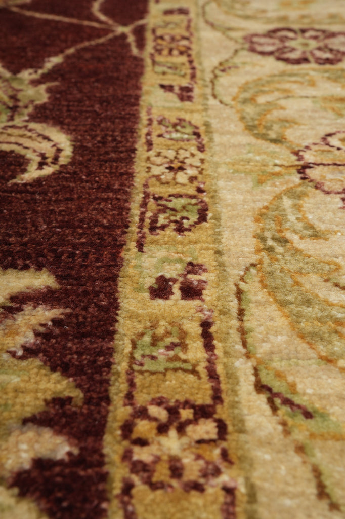 Close-up of a patterned rug with intricate designs.