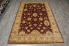 Load image into Gallery viewer, Decorative rug with intricate patterns on a wooden floor