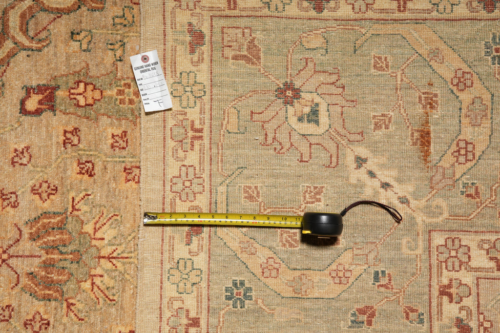 Decorative rug with a tape measure for scale on a floral patterned background