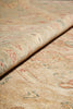 Load image into Gallery viewer, Close-up of a patterned rug with earthy tones