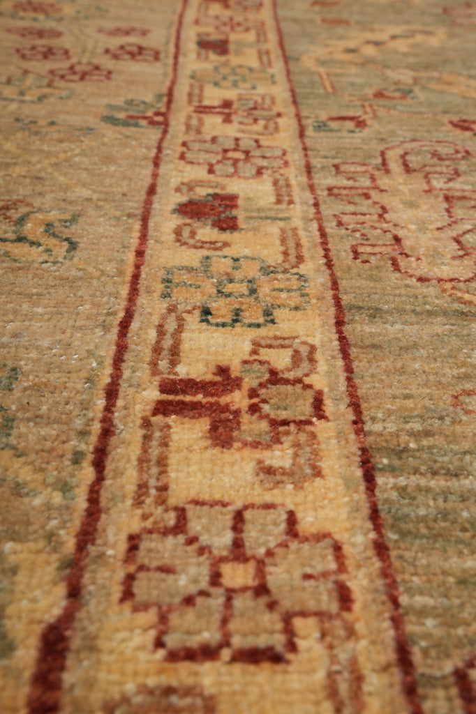 Close-up of a patterned rug with intricate designs.