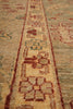 Load image into Gallery viewer, Close-up of a patterned rug with intricate designs.