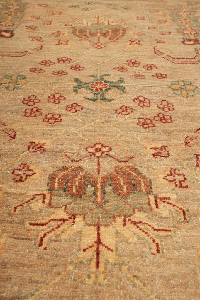 Close-up of a patterned rug with floral and geometric designs.