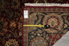 Load image into Gallery viewer, Decorative rug with a measuring tape and a small container on top, against a patterned wall.