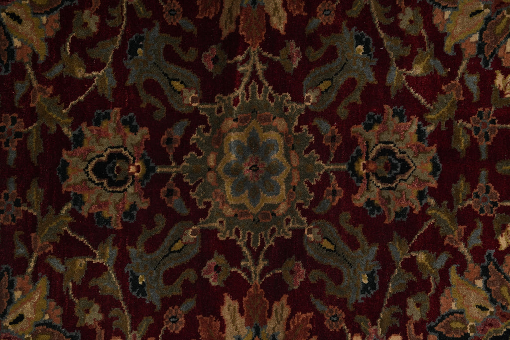 Close-up of a patterned rug with intricate designs.