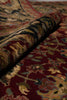 Load image into Gallery viewer, Close-up of a patterned rug with intricate designs.