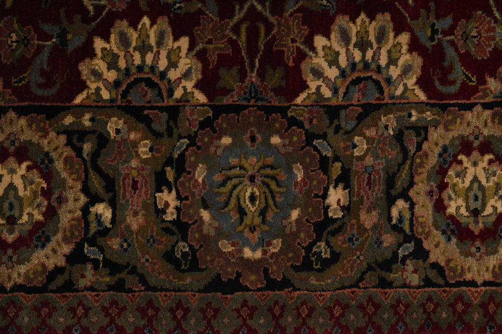 Close-up of a patterned rug with intricate designs.