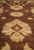 Load image into Gallery viewer, Close-up of a patterned rug with brown and beige colors