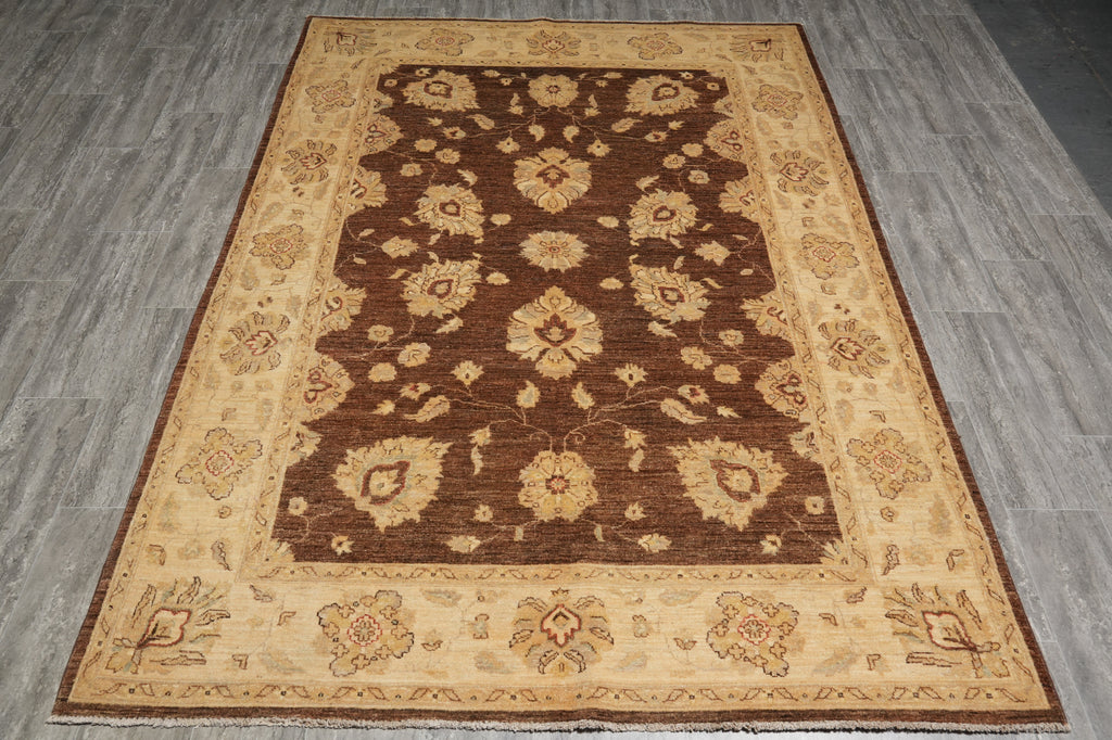 Decorative rug with floral patterns on a wooden floor