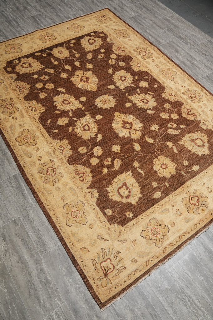 Decorative rug with floral pattern on a wooden floor