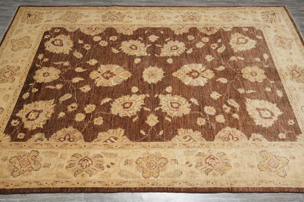 Decorative floral-patterned rug on a wooden floor