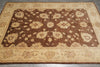 Load image into Gallery viewer, Decorative floral-patterned rug on a wooden floor