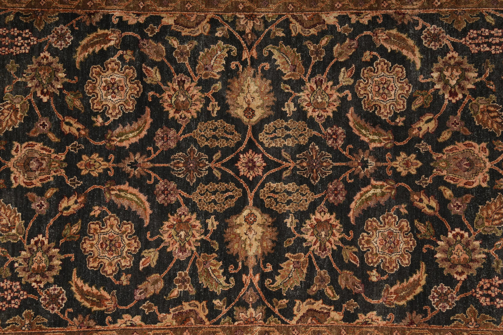 Close-up of a patterned rug with intricate designs.