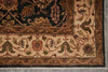 Load image into Gallery viewer, Close-up of an intricately designed rug with floral patterns on a neutral background.