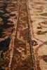 Load image into Gallery viewer, Close-up of a patterned rug with intricate designs.