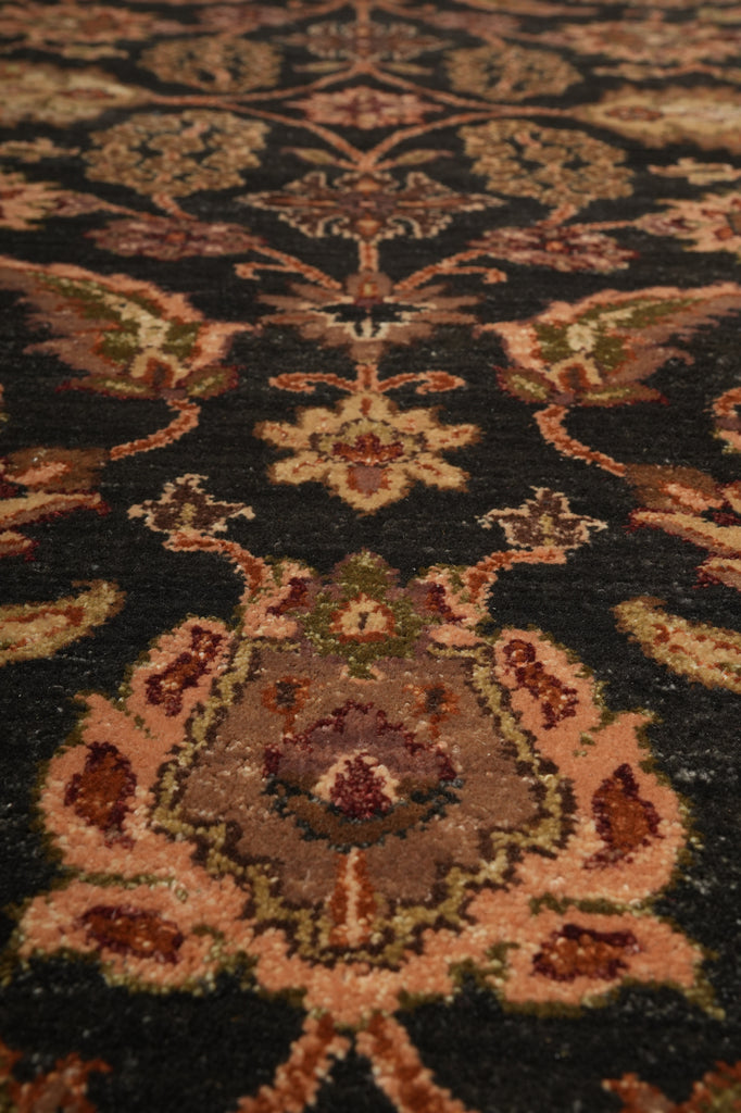 Close-up of a patterned rug with intricate designs.