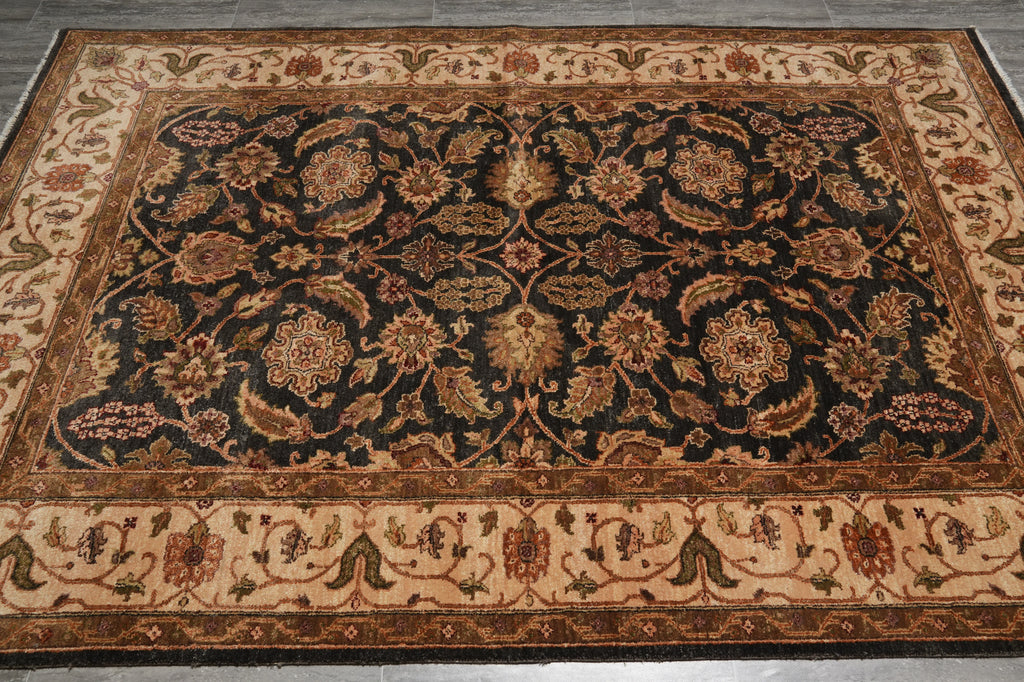 Decorative rug with intricate patterns on a plain background