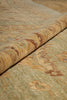 Load image into Gallery viewer, Close-up of a textured stone surface with brown and beige colors