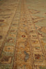 Load image into Gallery viewer, Close-up of a patterned rug with intricate designs.