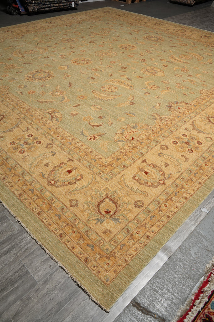 Decorative rug with intricate patterns on a gray floor