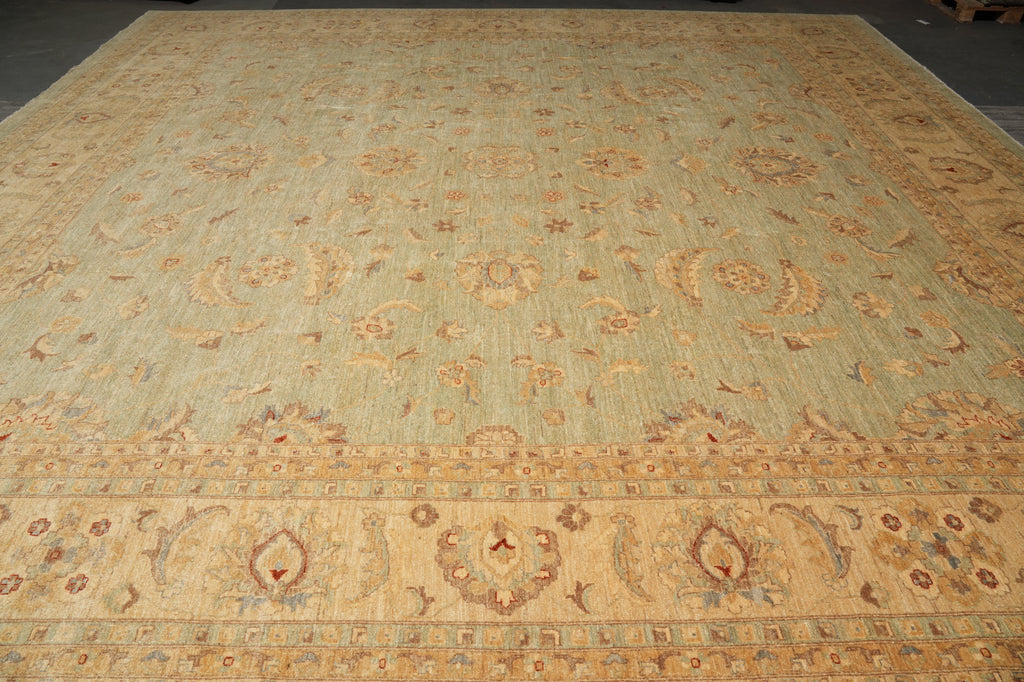 Large ornate rug with intricate patterns on a plain background