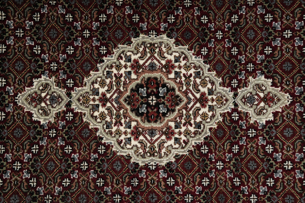 Decorative rug with intricate patterns and colors