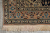 Load image into Gallery viewer, Close-up of a patterned rug with intricate designs on a concrete floor.