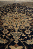 Load image into Gallery viewer, Close-up of a patterned rug with intricate designs.