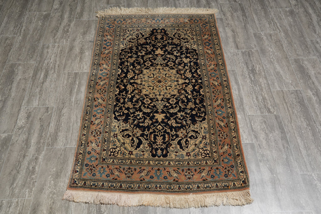 Decorative rug with intricate patterns on a wooden floor