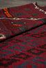 Load image into Gallery viewer, Close-up of a patterned fabric with red, blue, and black colors.