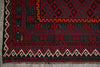 Load image into Gallery viewer, Close-up of a patterned rug with red, black, and beige colors on a gray surface.