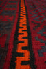 Load image into Gallery viewer, Close-up of a red and black patterned fabric
