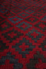 Load image into Gallery viewer, Close-up of a red and black patterned fabric
