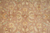 Load image into Gallery viewer, Patterned fabric with floral design on a brown background
